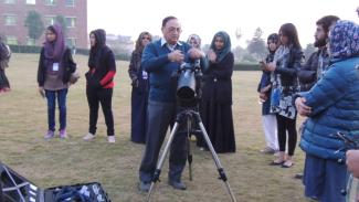 Dr Farrukh setting up his telescope